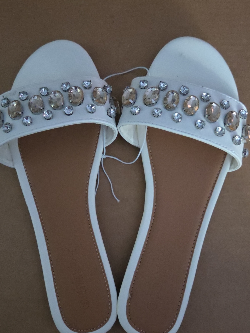 Olivia Miller White Slide Sandals with Champagne Gem Embellishments